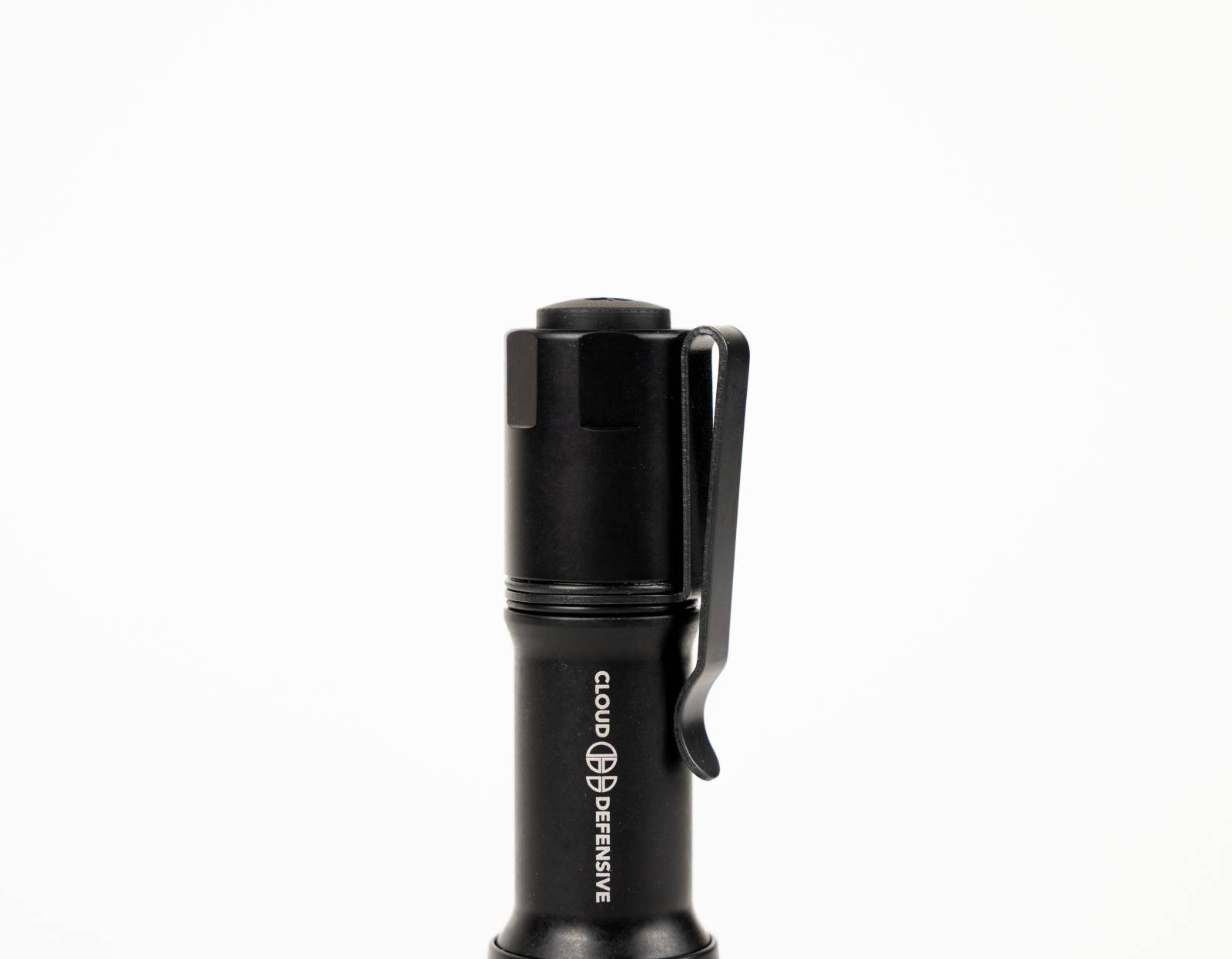 close up of of black MCH flashlight tailcap