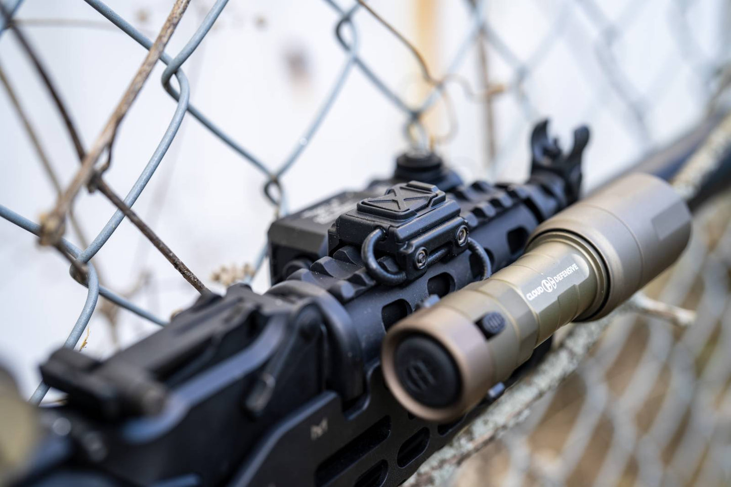 Close up of Rein single button constant on switch mounted to a handguard.