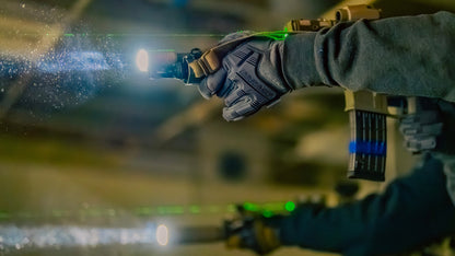A rifle with a laser and flashlight 